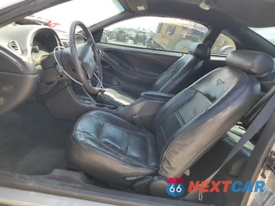 Zdjęcie 7 z 14 samochodu: 1999 FORD MUSTANG VIN:1FAFP4043XF168440 - miniatura