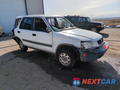 Czwarte zdjęcie samochodu z boku: 1999 HONDA CR-V LX VIN:JHLRD2842XC007705 - miniatura
