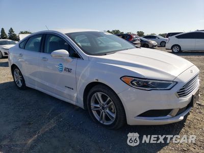 Czwarte zdjęcie samochodu z boku: 2018 FORD FUSION SE HYBRID VIN:3FA6P0LUXJR129827 - miniatura