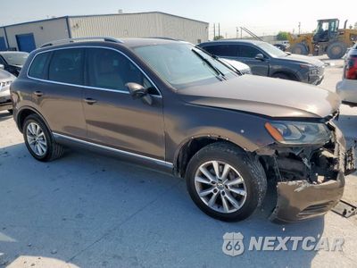 Czwarte zdjęcie samochodu z boku: 2013 VOLKSWAGEN TOUAREG V6 VIN:WVGEF9BP7DD001921 - miniatura