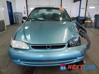 Piąte zdjęcie samochodu w środku: 1999 TOYOTA COROLLA VE VIN:1NXBR12E5XZ230080 - miniatura