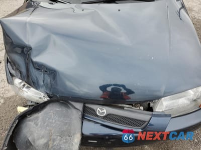 Zdjęcie 12 z 14 samochodu: 1998 MAZDA PROTEGE DX VIN:JM1BC1411W0238344 - miniatura
