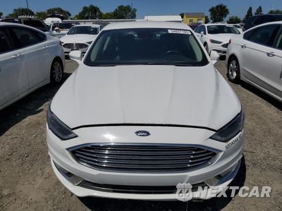 Piąte zdjęcie samochodu w środku: 2017 FORD FUSION SE HYBRID VIN:3FA6P0LU2HR408926 - miniatura