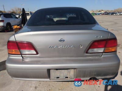 Zdjęcie 6 z 14 samochodu: 1999 NISSAN MAXIMA GLE VIN:JN1CA21A9XT707073 - miniatura