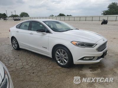 Czwarte zdjęcie samochodu z boku: 2017 FORD FUSION SE HYBRID VIN:3FA6P0LU6HR409741 - miniatura