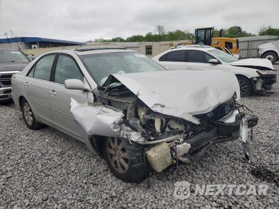 Czwarte zdjęcie samochodu z boku: 2003 TOYOTA CAMRY LE VIN:4T1BF30K53U552094 - miniatura