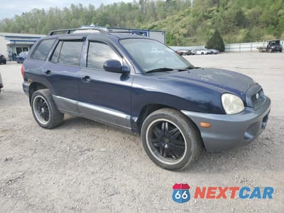 Czwarte zdjęcie samochodu z boku: 2004 HYUNDAI SANTA FE GLS VIN:KM8SC73E94U775858 - miniatura