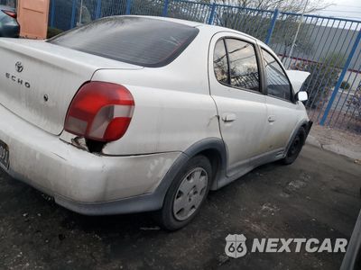 Trzecie zdjęcie samochodu z tyłu: 2002 TOYOTA ECHO VIN:JTDBT123525023602 - miniatura