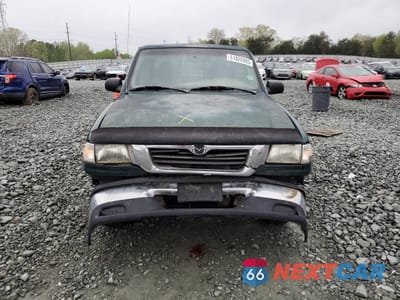 Piąte zdjęcie samochodu w środku: 1999 MAZDA B3000 CAB PLUS VIN:4F4YR16V5XTM15087 - miniatura