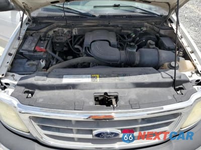 Zdjęcie 11 z 12 samochodu: 2003 FORD F150 VIN:2FTRF17W03CA55647 - miniatura