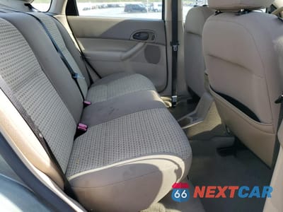 Zdjęcie 10 z 12 samochodu: 2004 FORD FOCUS ZX4 VIN:1FAHP34N06W142317 - miniatura