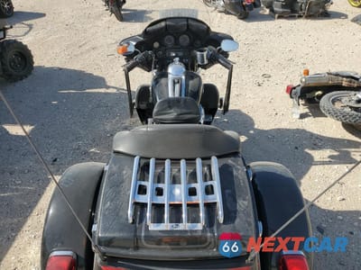 Zdjęcie 6 z 9 samochodu: 2012 HARLEY-DAVIDSON FLHTCUTG TRI GLIDE ULTRA CLASSIC VIN:1HD1MAM17CB853049 - miniatura