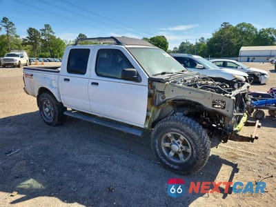 Czwarte zdjęcie samochodu z boku: 2003 NISSAN FRONTIER XE-V6 VIN:1N6ED27Y63C439981 - miniatura