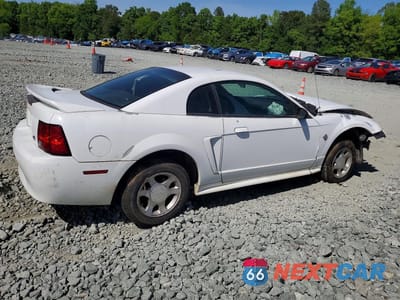 Trzecie zdjęcie samochodu z tyłu: 1999 FORD MUSTANG VIN:1FAFP4040XF132365 - miniatura