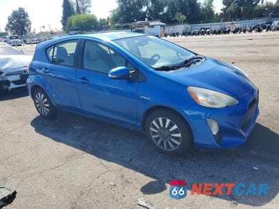 Czwarte zdjęcie samochodu z boku: 2015 TOYOTA PRIUS C ONE VIN:JTDKDTB31F1113092 - miniatura