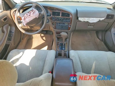Zdjęcie 8 z 12 samochodu: 1994 TOYOTA CAMRY LE VIN:JT2SK12E9R0250330 - miniatura