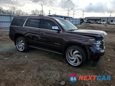 Czwarte zdjęcie samochodu z boku: 2020 CHEVROLET TAHOE K1500 PREMIER VIN:1GNSKCKC9LR197981 - miniatura
