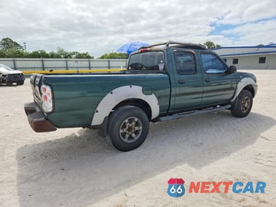 Trzecie zdjęcie samochodu z tyłu: 2002 NISSAN FRONTIER XE-V6 VIN:1N6ED29X22C317234 - miniatura