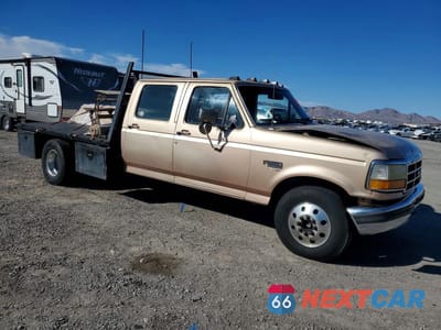 Czwarte zdjęcie samochodu z boku: 1997 FORD F350 FLATBED TRUCK VIN:1FTJW35F2VEC25810 - miniatura