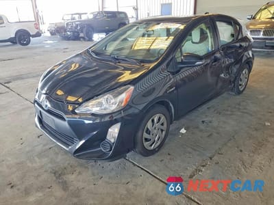 2015 TOYOTA PRIUS C ONE JTDKDTB36F1113654 - główne zdjęcie licytacji z USA - miniatura