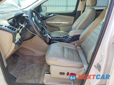 Zdjęcie 7 z 13 samochodu: 2016 FORD ESCAPE TITANIUM VIN:1FMCU0J94GUB52988 - miniatura