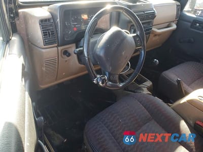 Zdjęcie 8 z 11 samochodu: 1999 JEEP WRANGLER / TJ SPORT VIN:1J4FY19S1XP424277 - miniatura