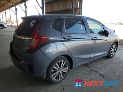 Trzecie zdjęcie samochodu z tyłu: 2015 HONDA FIT EX VIN:3HGGK5H87FM767013 - miniatura