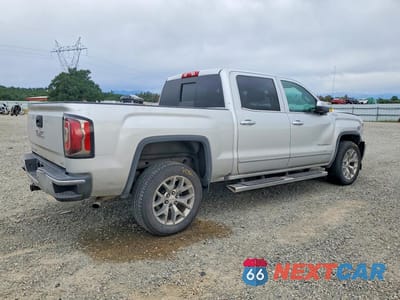 Trzecie zdjęcie samochodu z tyłu: 2018 GMC SIERRA K1500 SLT VIN:3GTU2NEC1JG637228 - miniatura