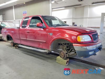 Czwarte zdjęcie samochodu z boku: 2001 FORD F150 VIN:2FTRX18L61CA30766 - miniatura