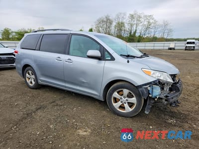 Czwarte zdjęcie samochodu z boku: 2014 TOYOTA SIENNA LE 8-PASSENGER VIN:5TDKK3DC6ES410055 - miniatura