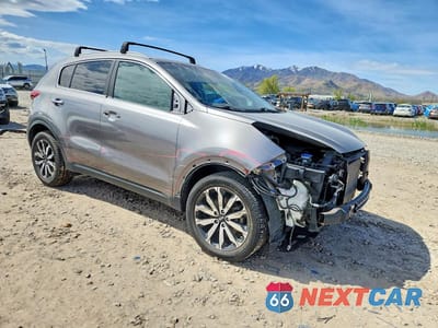 Czwarte zdjęcie samochodu z boku: 2017 KIA SPORTAGE EX VIN:KNDPNCAC9H7034029 - miniatura