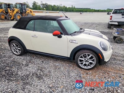 Czwarte zdjęcie samochodu z boku: 2009 MINI COOPER S VIN:WMWMS33529TY07536 - miniatura