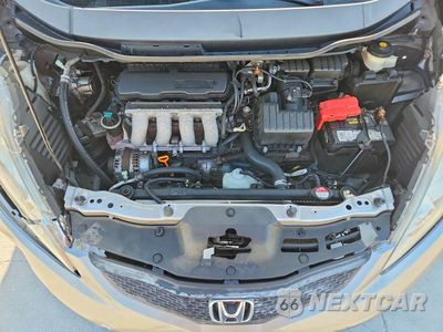 Zdjęcie 11 z 12 samochodu: 2009 HONDA FIT SPORT VIN:JHMGE88429S068466 - miniatura