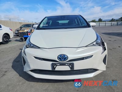 Piąte zdjęcie samochodu w środku: 2017 TOYOTA PRIUS TWO VIN:JTDKBRFU7H3040412 - miniatura