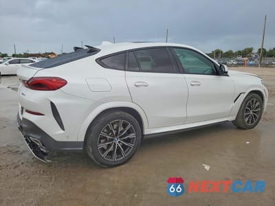 Trzecie zdjęcie samochodu z tyłu: 2020 BMW X6 XDRIVE40I VIN:5UXCY6C09L9C54702 - miniatura