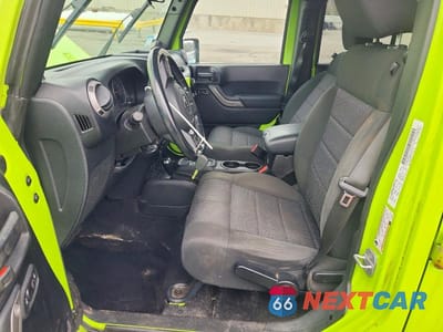 Zdjęcie 7 z 12 samochodu: 2012 JEEP WRANGLER UNLIMITED SPORT VIN:1C4HJWDGXCL262623 - miniatura