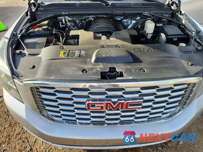 Zdjęcie 12 z 13 samochodu: 2018 GMC YUKON XL DENALI VIN:1GKS1HKJ4JR208233 - miniatura