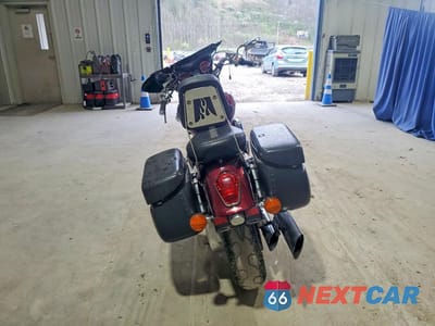 Czwarte zdjęcie samochodu z boku: 2006 HONDA VTX1300 C VIN:1HFSC55016A215000 - miniatura