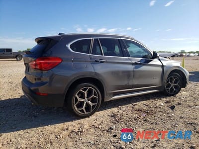 Trzecie zdjęcie samochodu z tyłu: 2017 BMW X1 XDRIVE28I VIN:WBXHT3C39H5F85148 - miniatura