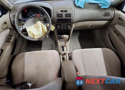 Zdjęcie 8 z 12 samochodu: 2001 TOYOTA COROLLA LE VIN:1NXBR12E31Z536282 - miniatura