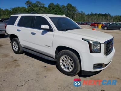 Czwarte zdjęcie samochodu z boku: 2015 GMC YUKON SLE VIN:1GKS1AKC7FR666154 - miniatura