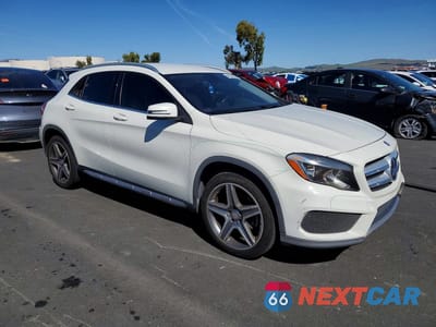 Czwarte zdjęcie samochodu z boku: 2015 MERCEDES-BENZ GLA 250 4MATIC VIN:WDCTG4GB1FJ065637 - miniatura