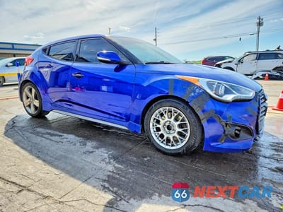 Czwarte zdjęcie samochodu z boku: 2014 HYUNDAI VELOSTER TURBO VIN:KMHTC6AE2EU186590 - miniatura