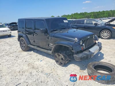 Czwarte zdjęcie samochodu z boku: 2010 JEEP WRANGLER UNLIMITED SAHARA VIN:1J4HA5H15AL213434 - miniatura