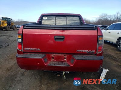 Zdjęcie 6 z 12 samochodu: 2006 HONDA RIDGELINE RT VIN:2HJYK16226H528456 - miniatura