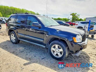 Czwarte zdjęcie samochodu z boku: 2007 JEEP GRAND CHEROKEE LAREDO VIN:1J8GR48K07C581423 - miniatura