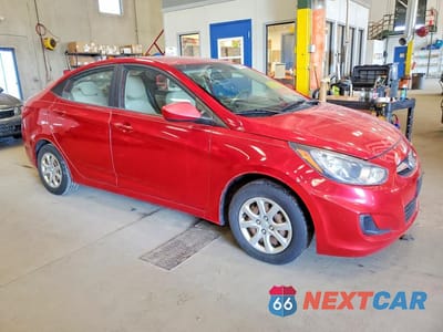 Czwarte zdjęcie samochodu z boku: 2012 HYUNDAI ACCENT GLS VIN:KMHCT4AE4CU145881 - miniatura