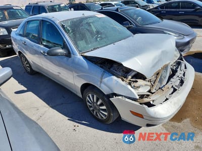 Czwarte zdjęcie samochodu z boku: 2007 FORD FOCUS ZX4 VIN:1FAFP34NX7W211040 - miniatura