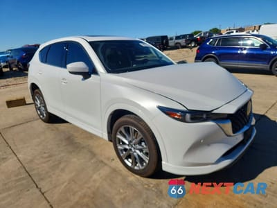 Czwarte zdjęcie samochodu z boku: 2025 MAZDA CX-5 PREMIUM PLUS VIN:JM3KFBEM2S0780012 - miniatura