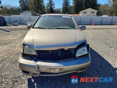 Piąte zdjęcie samochodu w środku: 2002 TOYOTA SIENNA LE VIN:4T3ZF13C12U484390 - miniatura